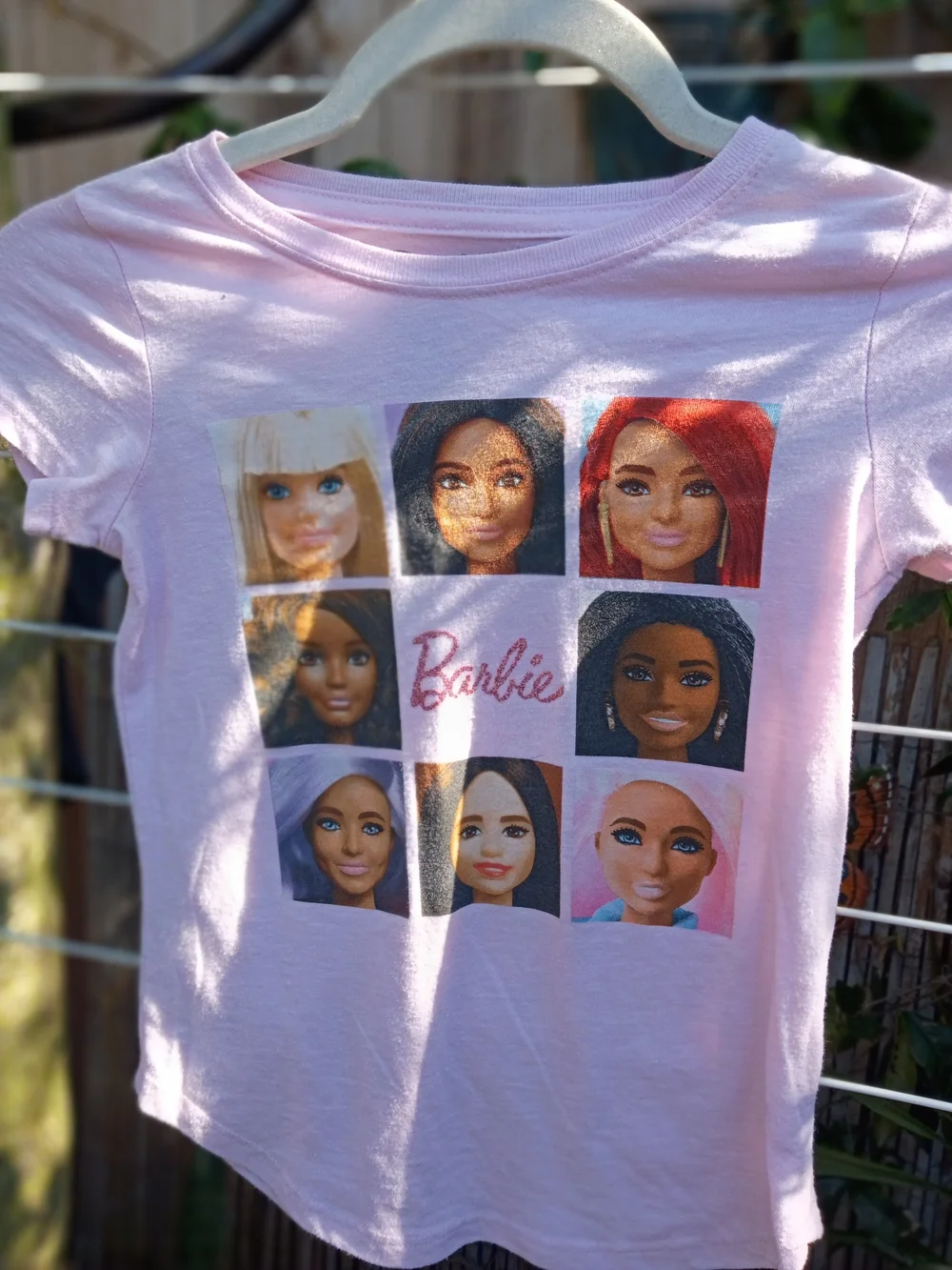 Barbie Light Pink Tee with Multicolor Doll Portrait Grid